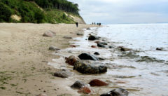 Zwischen Dünen, Wasser und Wolken: Strandwanderung im Woliner Nationalpark.